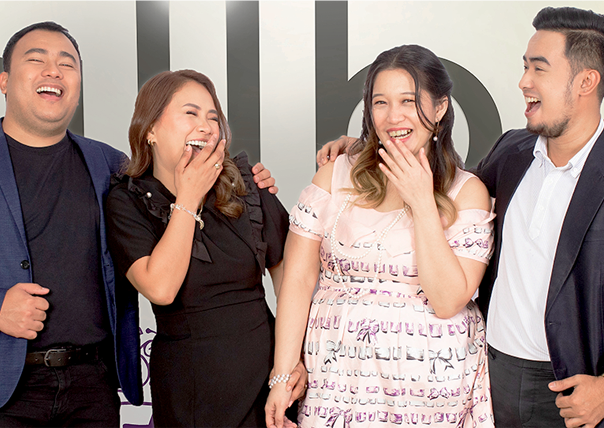 Kology team working together in a modern office