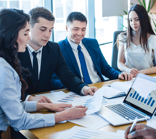 Sales management team with performance metrics
