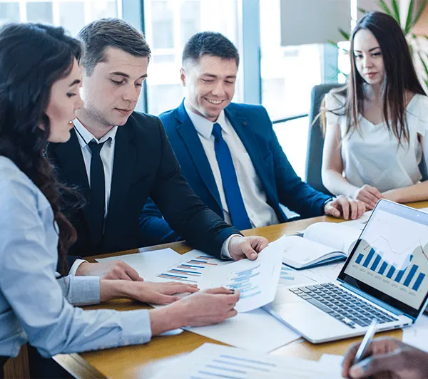 Sales management team with performance metrics